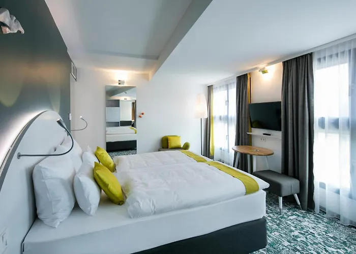 Arcotel Donauzentrum 4*